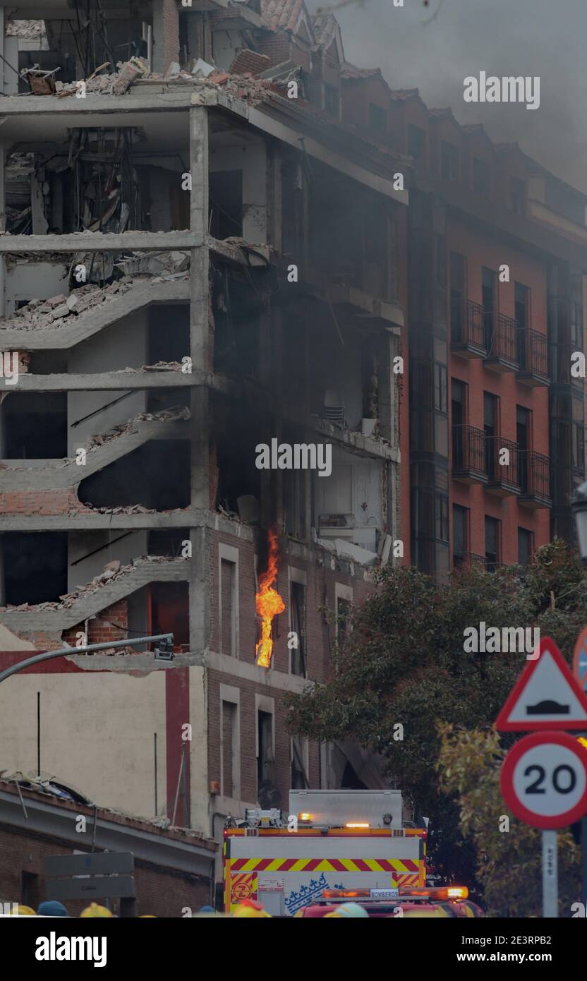 Madrid, Spain. 20th Jan, 2021. Fire burns in a building after an explosion. The cause of the accident is still unknown. Credit: Juan Carlos Rojas/dpa/Alamy Live News Stock Photo