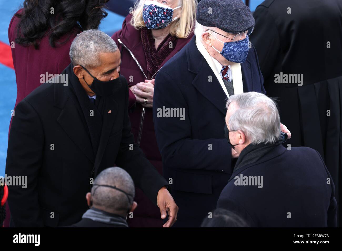 WASHINGTON, DC - JANUARY 20: Former U.S. President Barack Obama greets Sen.  Dick Durbin (D-IL) as he and former first lady Michelle Obama arrive to the  inauguration of U.S. President-elect Joe Biden