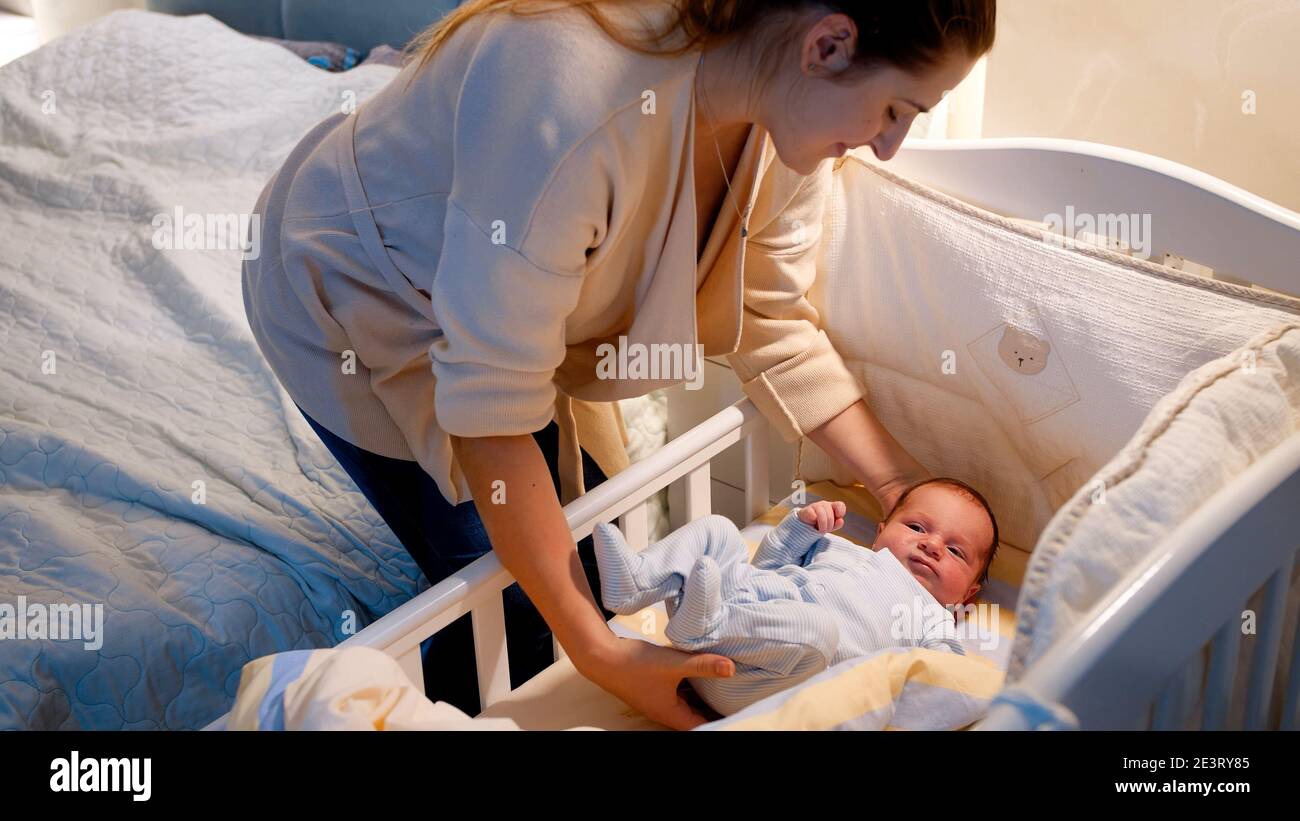 Covering baby with blanket at clearance night