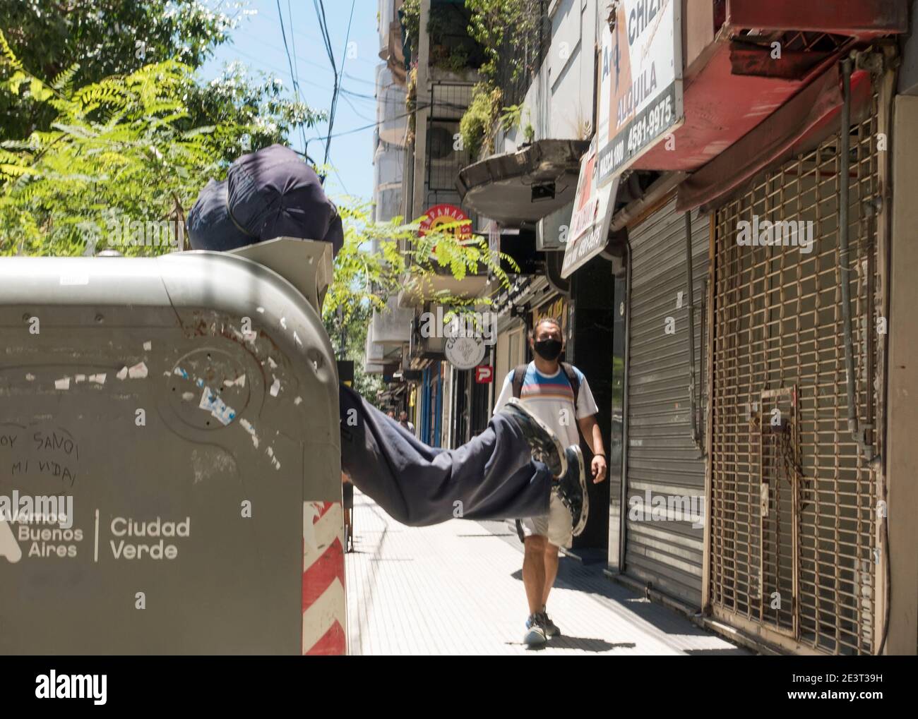 Dumpster diver in Buenos Aires, Argentina Stock Photo