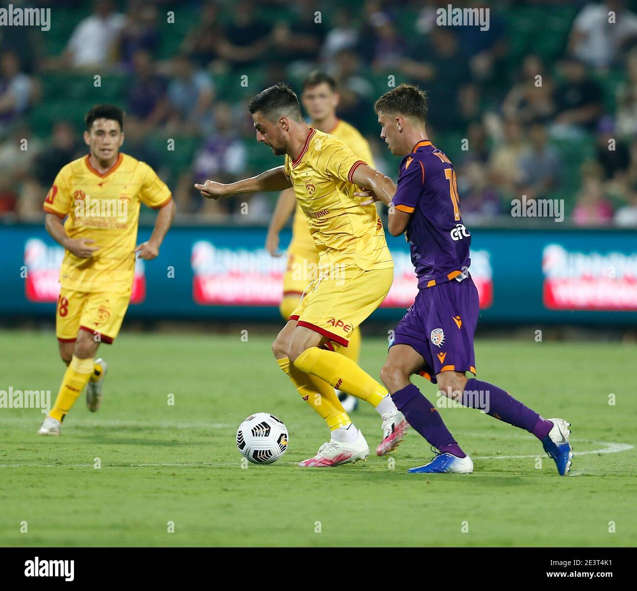 Perth, Western Australia, Australia. 20th January 2021; HBF Park, Perth, Western Australia, Australia; A League Football, Perth Glory versus Adelaide United; Tomi Juric from Adelaide United controls the ball in front of Callum Timmins of the Perth Glory Credit: Action Plus Sports Images/Alamy Live News Stock Photo