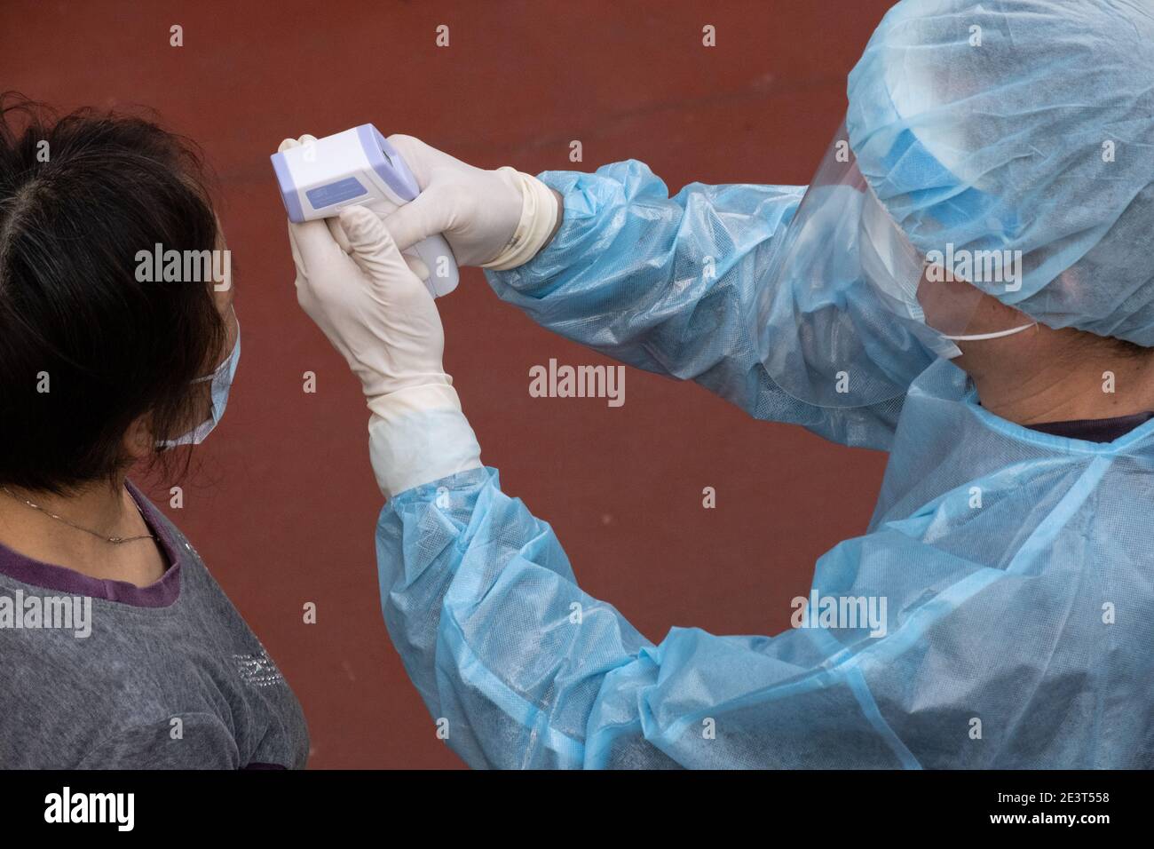 Hong Kong, China. 20th Jan, 2021. A medical worker wearing a personal
