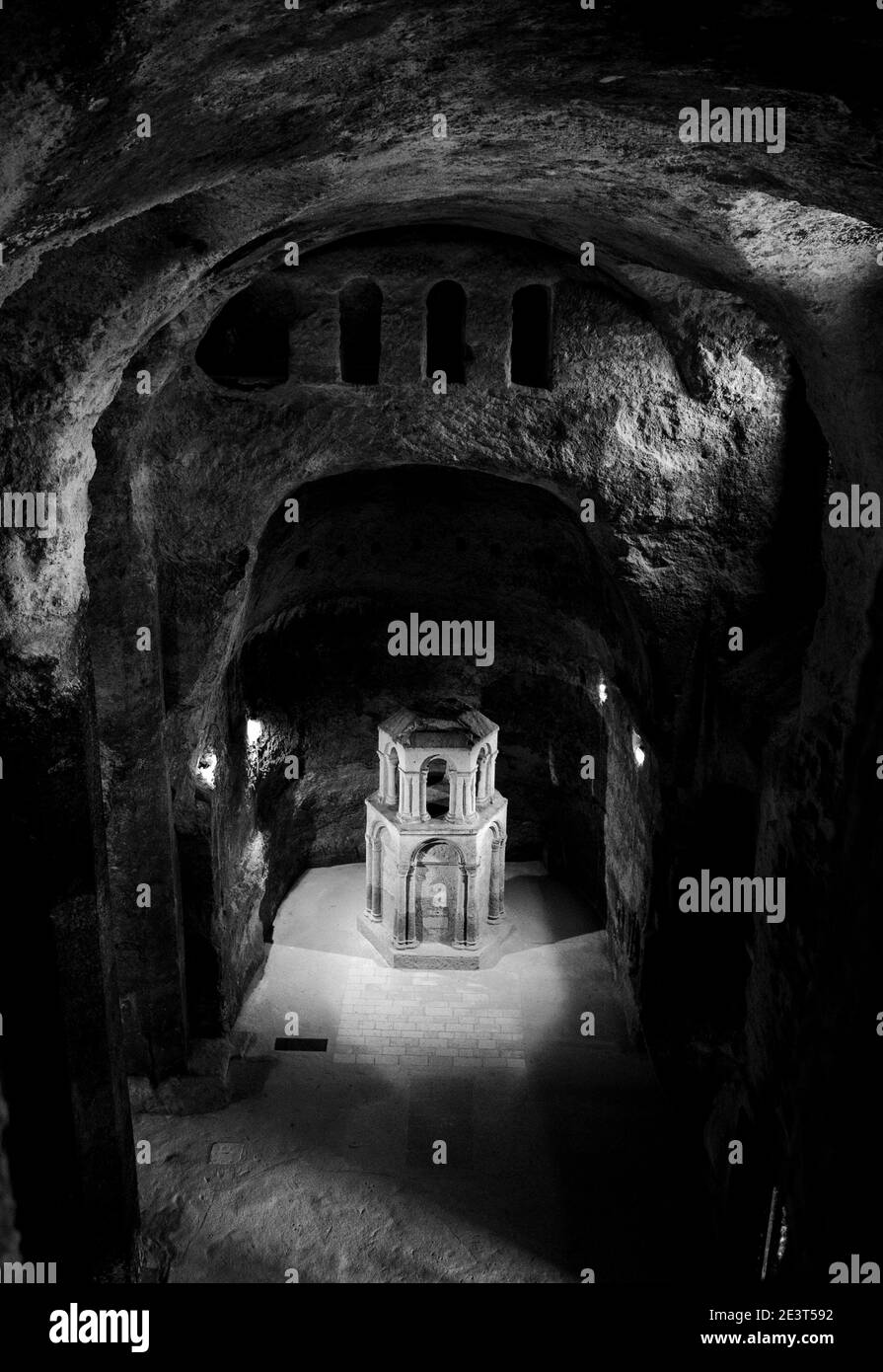 AUBETERRE-SUR-DRONNE, FRANCE. Subterranean monolithic church of Saint-Jean carved into a cliff - the largest underground church. Black white photo Stock Photo