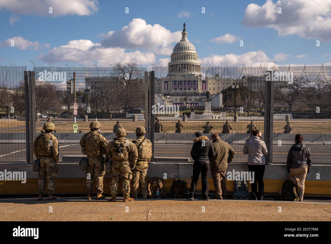 Washington, United States. 20th Jan, 2021. Members of the Minnesota National Guard listen as President Joseph Robinette Biden Jr. speaks to the Nation after he took the oath of office as the 46th President of the United States at the Capitol in Washington, DC on Wednesday, January 20, 2021. Photo by Ken Cedeno/UPI Credit: UPI/Alamy Live News Stock Photo