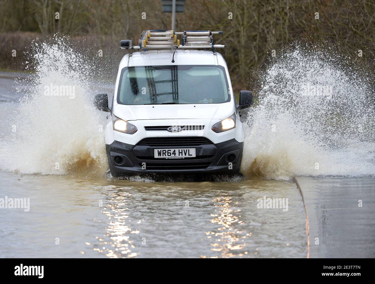 Leicester, Leicestershire, UK 19th Jan 2021. UK. Weather. Flooding. Cars drive through flood water caused by Storm Christoph on Mountsorrel Lane in Leicestershire. Alex Hannam/Alamy Live News Stock Photo