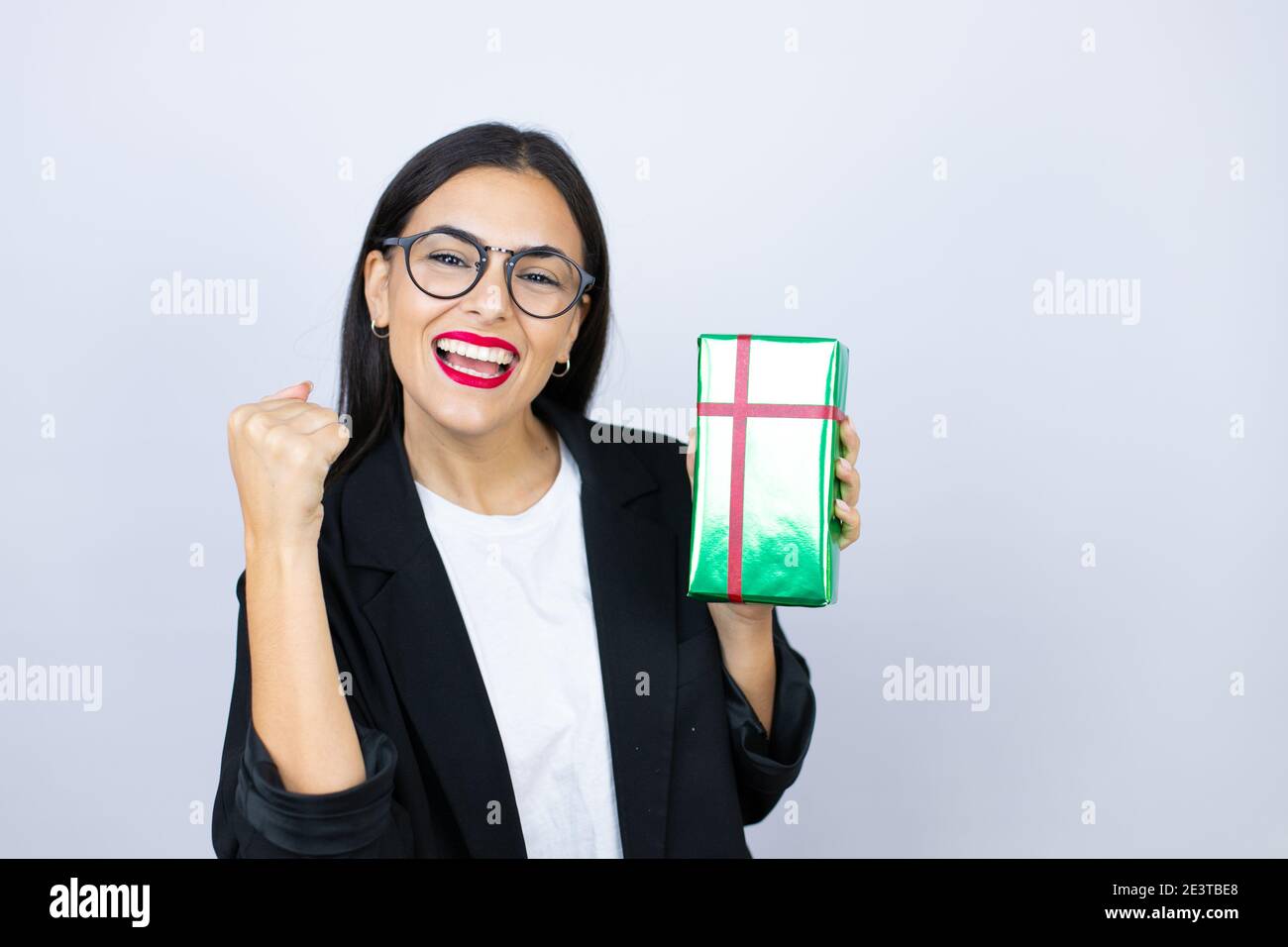 Beautiful woman holding sign hi-res stock photography and images - Alamy