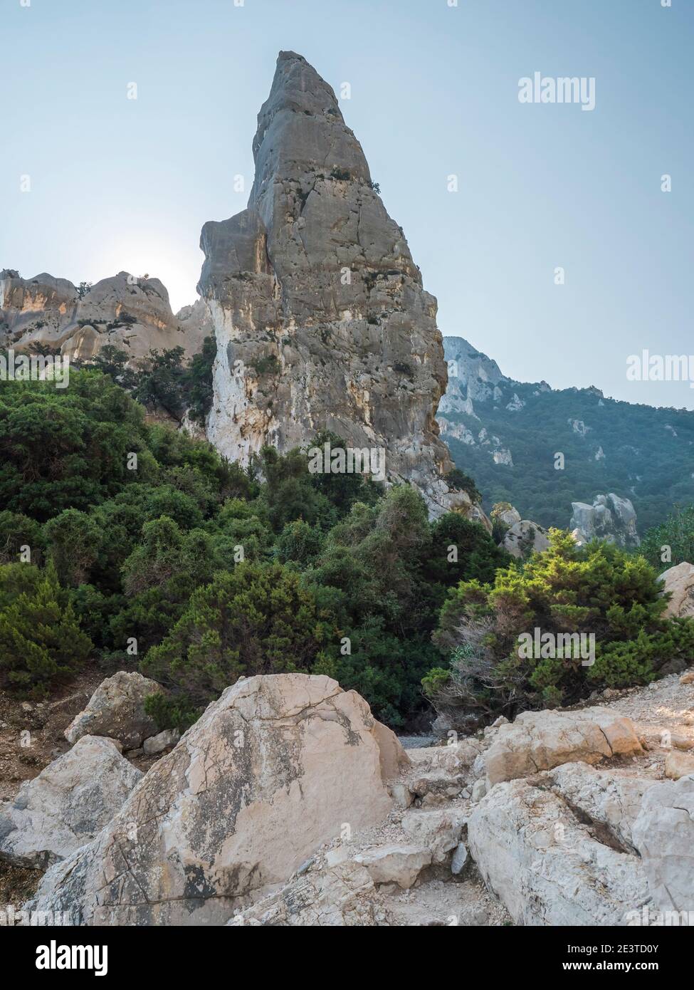A view of limestone rock pillar Aguglia at Cala Goloritze beach at Gulf of Orosei. Famous travel destination. Sardinia, Italy, September Stock Photo
