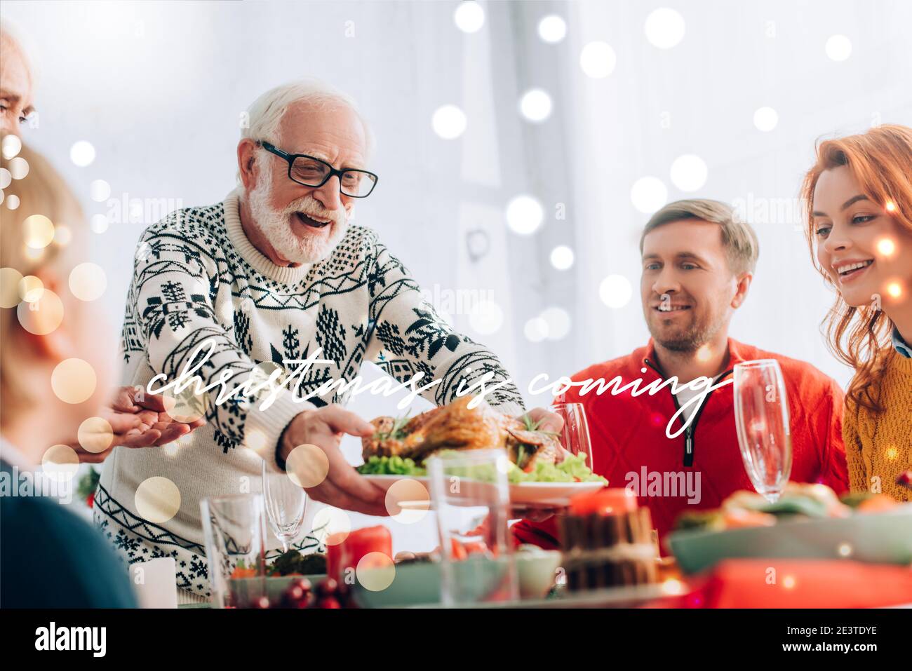 happy grandfather serving turkey on festive table near family, christmas is coming illustration Stock Photo
