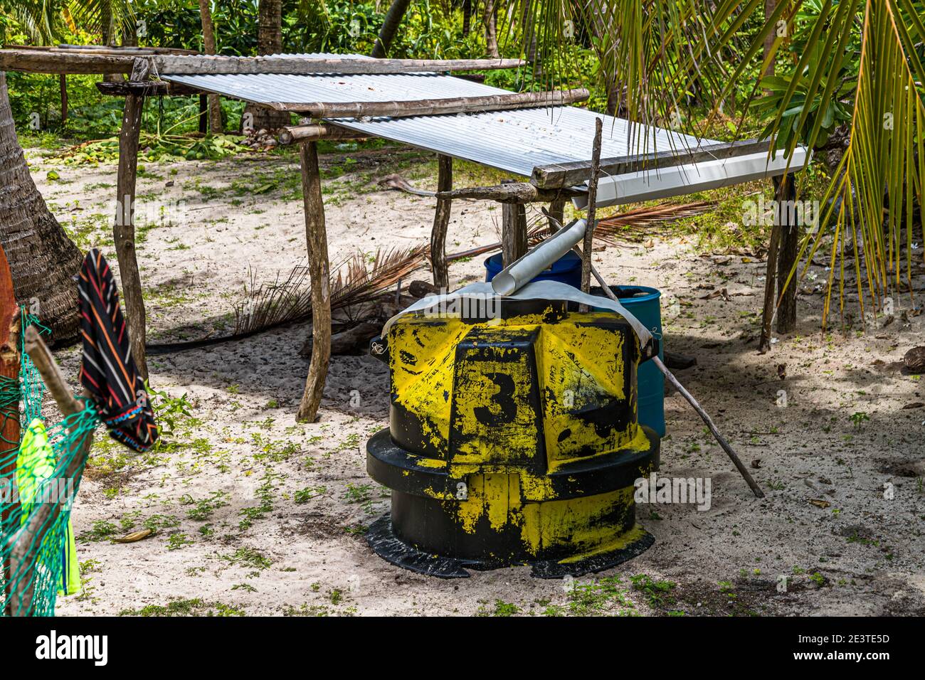 In Papua New Guinea, rainwater is collected as drinking water using a simple construction Stock Photo