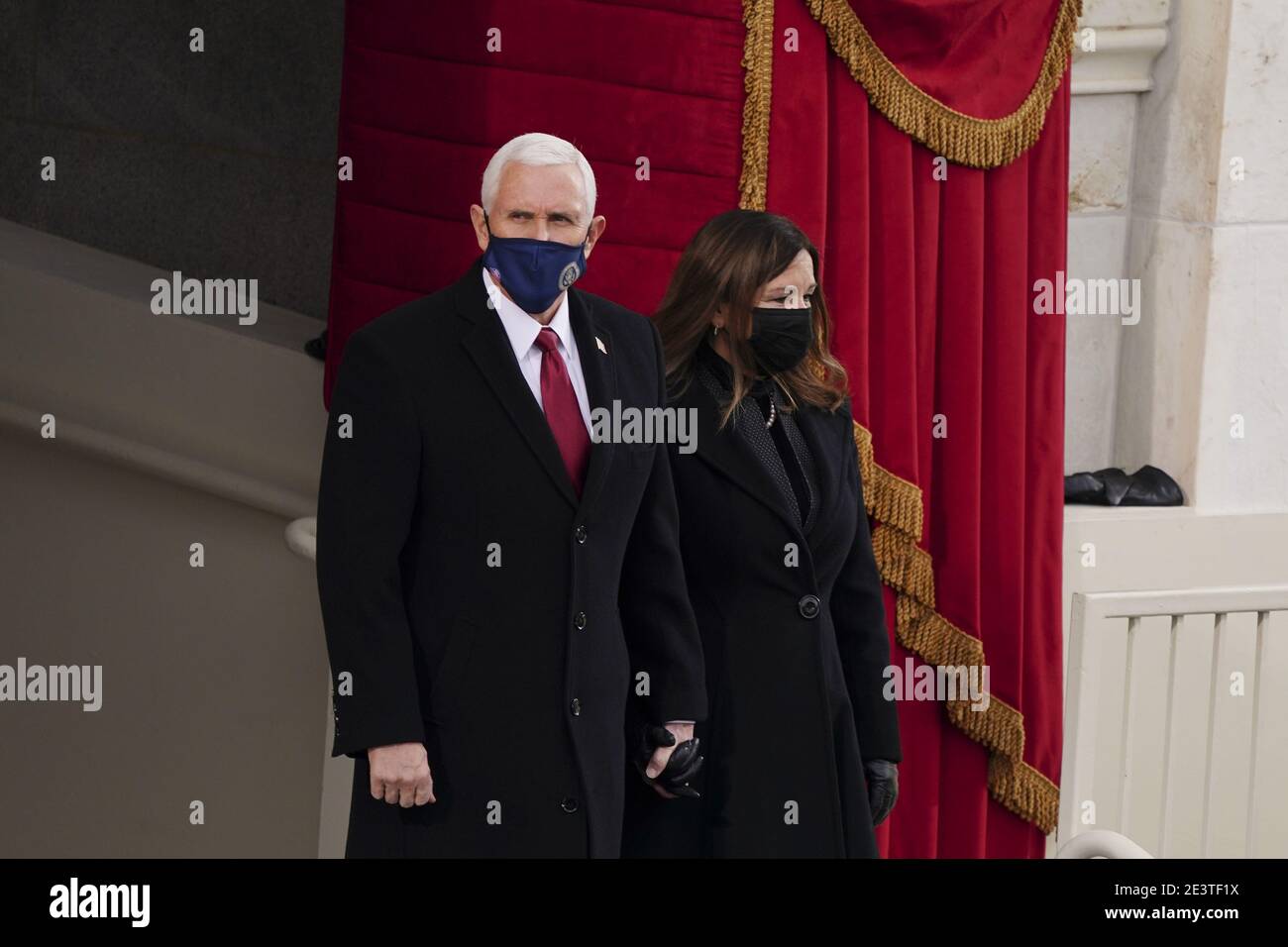 U.S. Vice President Mike Pence and Second Lady Karen Pence arrive to the 59th presidential inauguration in Washington, DC, U.S., on Wednesday, Jan. 20, 2021. Biden will propose a broad immigration overhaul on his first day as president, including a shortened pathway to U.S. citizenship for undocumented migrants - a complete reversal from Donald Trump's immigration restrictions and crackdowns, but one that faces major roadblocks in Congress. Photographer: Kevin Dietsch/UPI/Bloomberg/MediaPunch Stock Photo