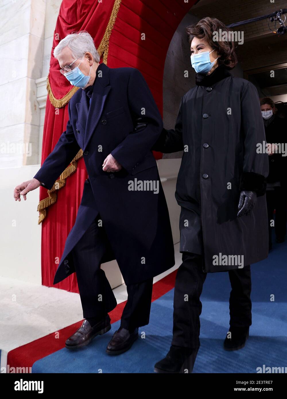 Washington, United States. 20th Jan, 2021. Senator Mitch McConnell (R-KY) arrives with his wife Elaine Chao during the inauguration of Joe Biden as the 46th President of the United States on the West Front of the U.S. Capitol in Washington on January 20, 2021. Pool Photo by Jonathan Ernst/UPI Credit: UPI/Alamy Live News Stock Photo