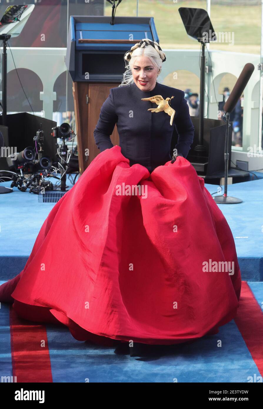 Washington, DC. 20th Jan, 2021.Singer Lady Gaga walks after she sang the National Anthem during the inauguration of Joe Biden as the 46th President of the United States on the West Front Washington, DC. 20th Jan, 2021.Singer Lady Gaga walks after she sang the National Anthem during the inauguration of Joe Biden as the 46th President of the United States on the West Front