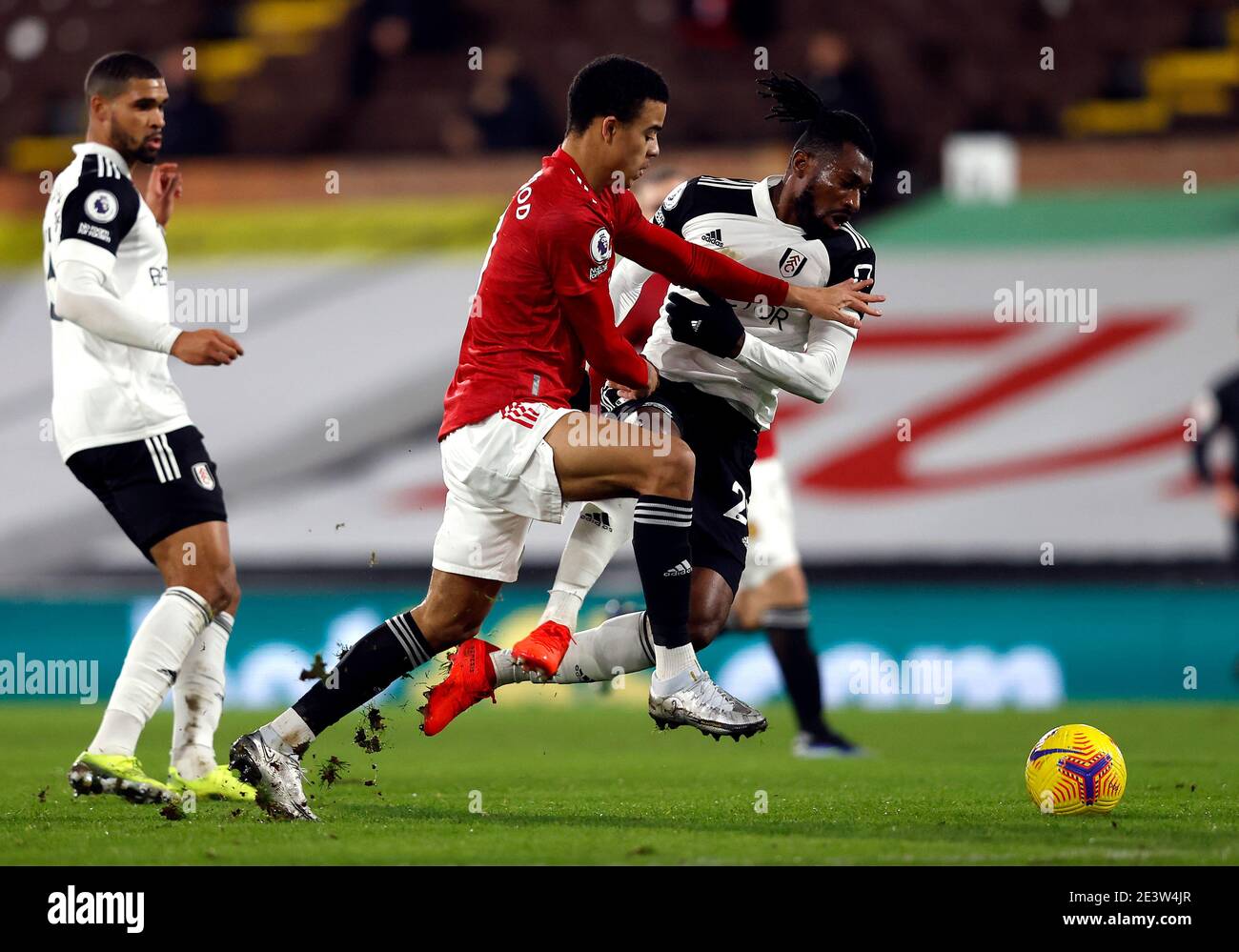 Fulham S Andre Frank Zambo Anguissa Right And Manchester United S Mason Greenwood Battle For The Ball During The Premier League Match At Craven Cottage London Picture Date Wednesday January 21 Stock Photo Alamy