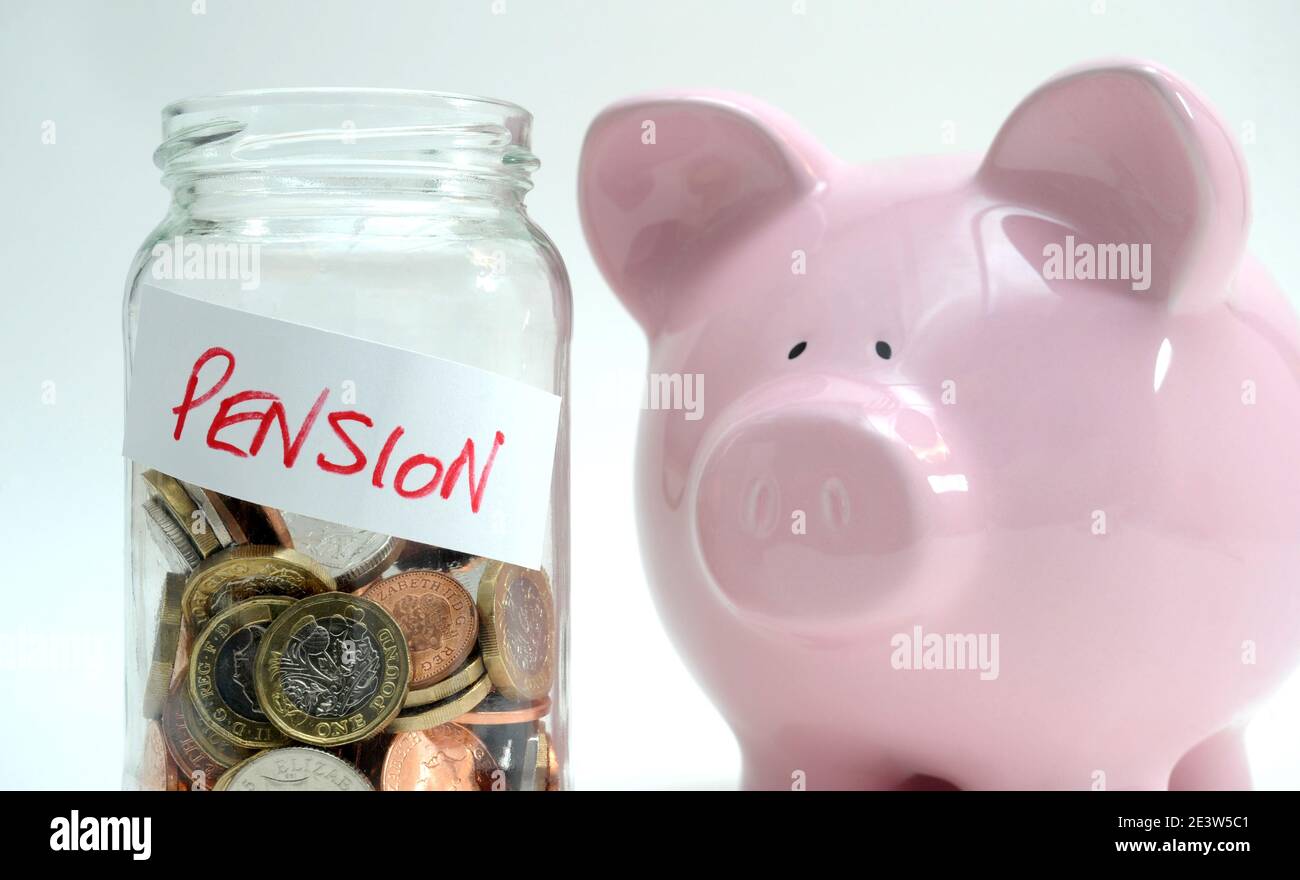 PENSION POT JAR WITH PIGGY BANK RE PENSIONS RETIREMENT SAVINGS PENSION SCHEME ETC UK Stock Photo