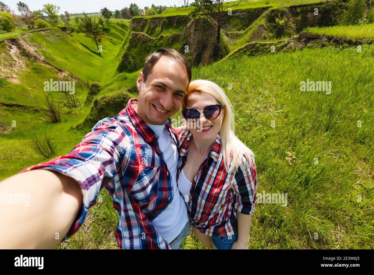 Two hikers taking selfie on top of the mountain Stock Photo - Alamy