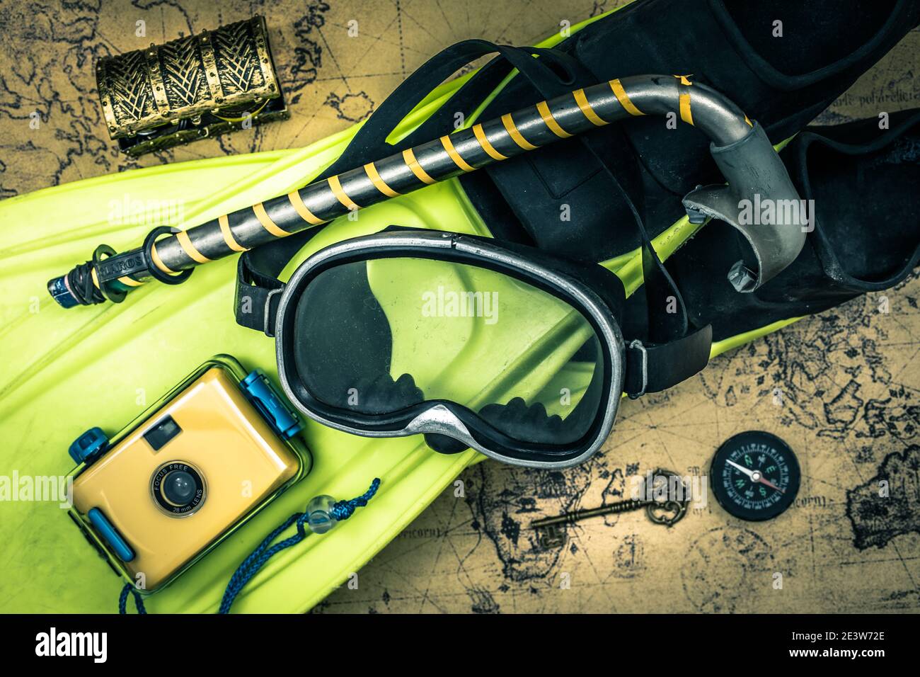 Scuba gear, vintage compass, underwater camera, treasure chest and old
