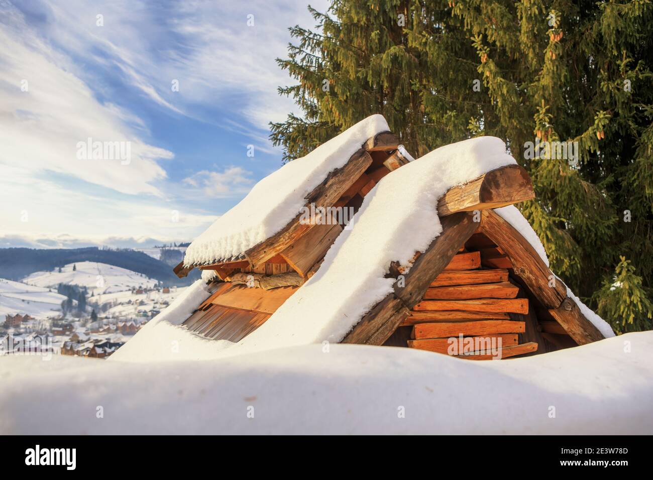 The roof of the mountain covered with snow house Stock Photo - Alamy