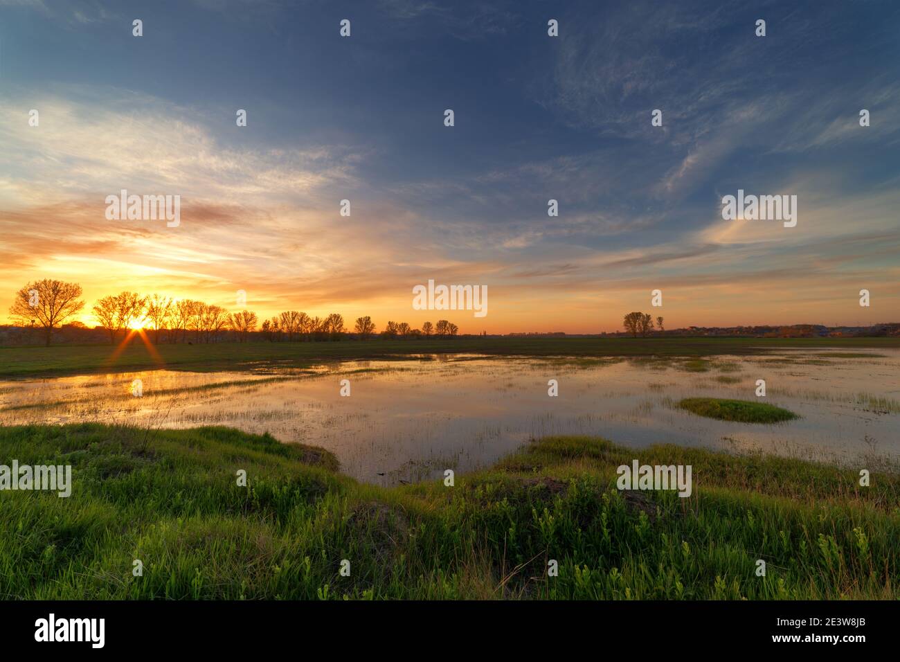 sunset on the river Stock Photo - Alamy