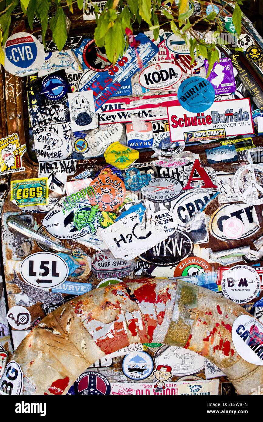 Solid frame of a collection of stickers and bumper stickers in Key West