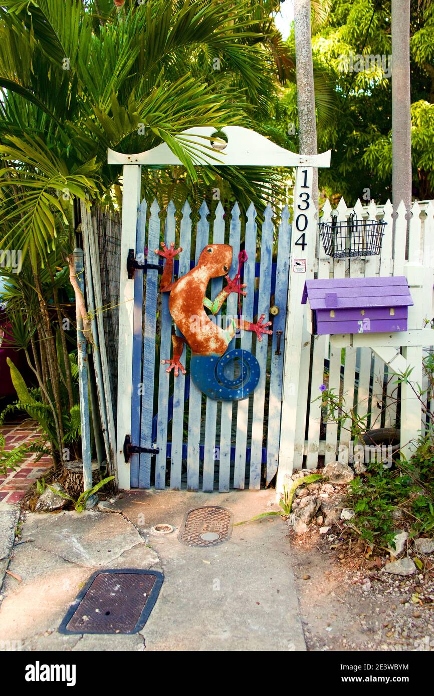 Entrance gate with metal Gekco lizard in Key West, FL, USA. Famous destination location. Stock Photo