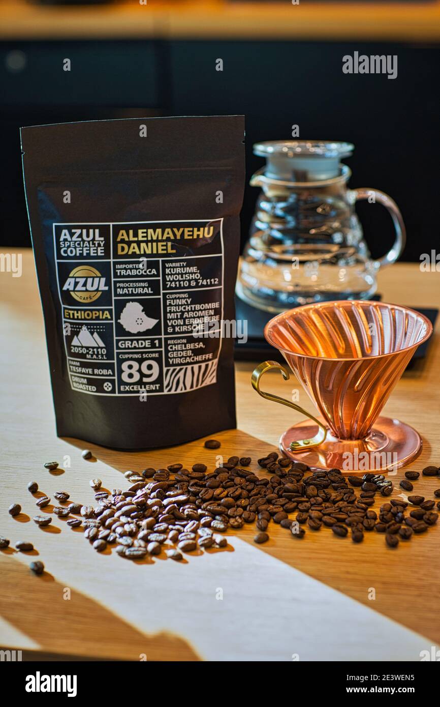 Hario V60 copper filter with coffee beans Stock Photo