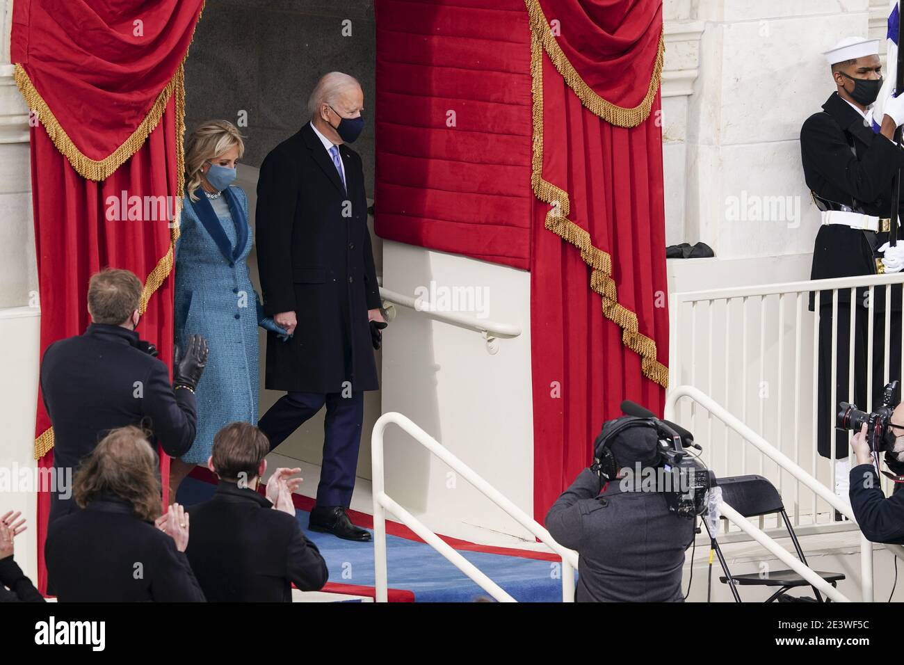U.S. President-elect Joe Biden, right, and Dr. Jill Biden arrive to the 59th presidential inauguration in Washington, DC, U.S., on Wednesday, Jan. 20, 2021. Biden will propose a broad immigration overhaul on his first day as president, including a shortened pathway to U.S. citizenship for undocumented migrants - a complete reversal from Donald Trump's immigration restrictions and crackdowns, but one that faces major roadblocks in Congress. Photographer: Kevin Dietsch/UPI/MediaPunch Stock Photo