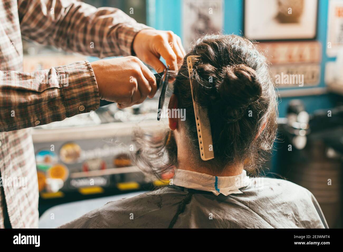 Photo of barber working on haircut in salon Stock Photo Alamy