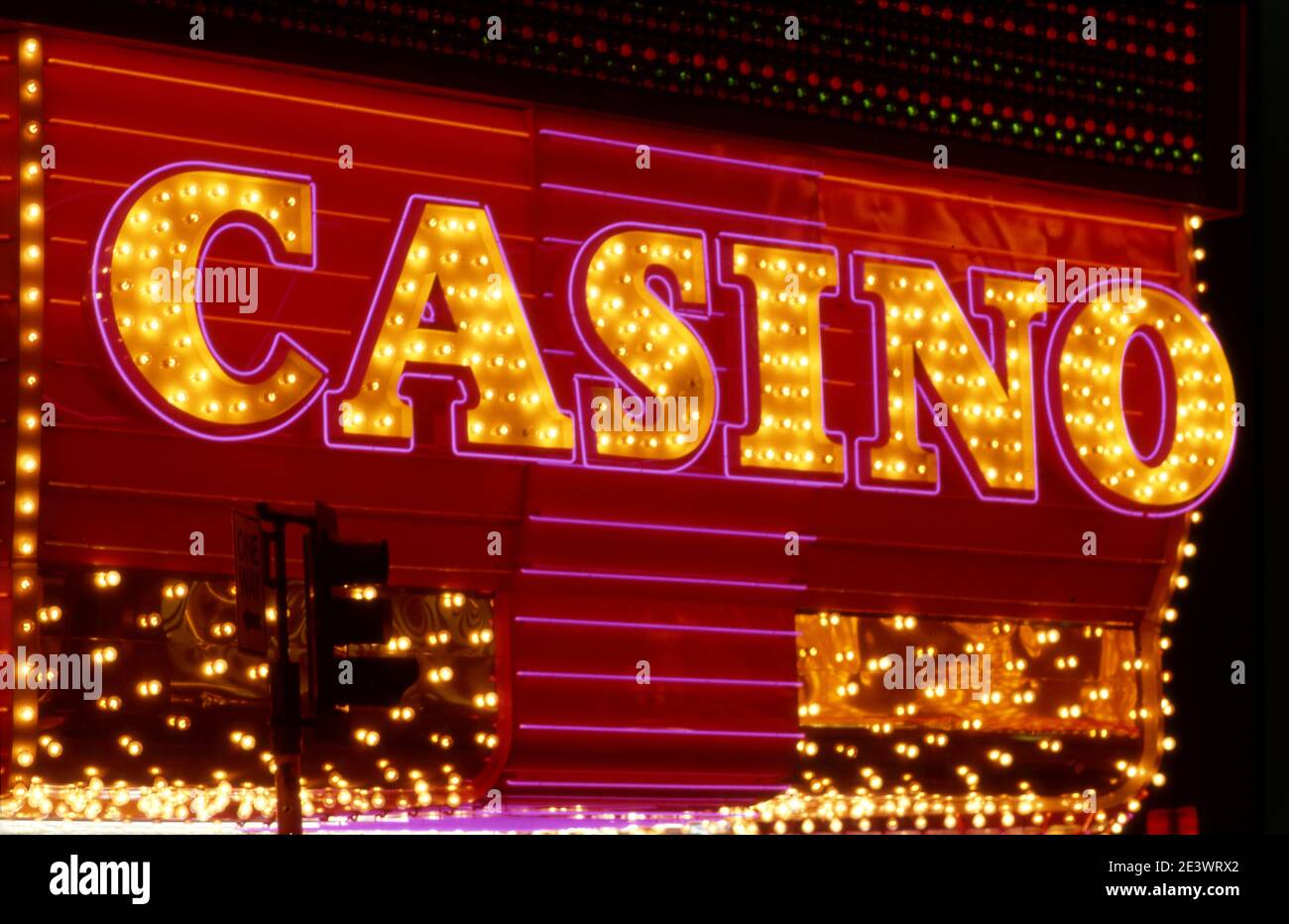 Casino sign in neon light on Fremont Street in Downtown Las Vegas, NV Stock Photo