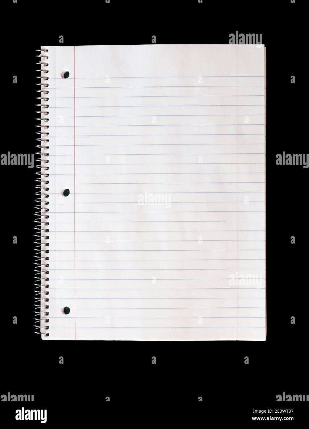 An isolated spiral notebook isolated on a black background Stock Photo