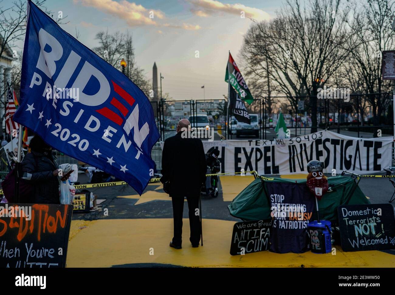 Washington, United States. 20th Jan, 2021. A man looks at the White House from Black Lives Matter Plaza following the inauguration of Joe Biden as the 46th President of the United States on Wednesday January 20, 2021. Photo by Jemal Countess/UPI Credit: UPI/Alamy Live News Stock Photo