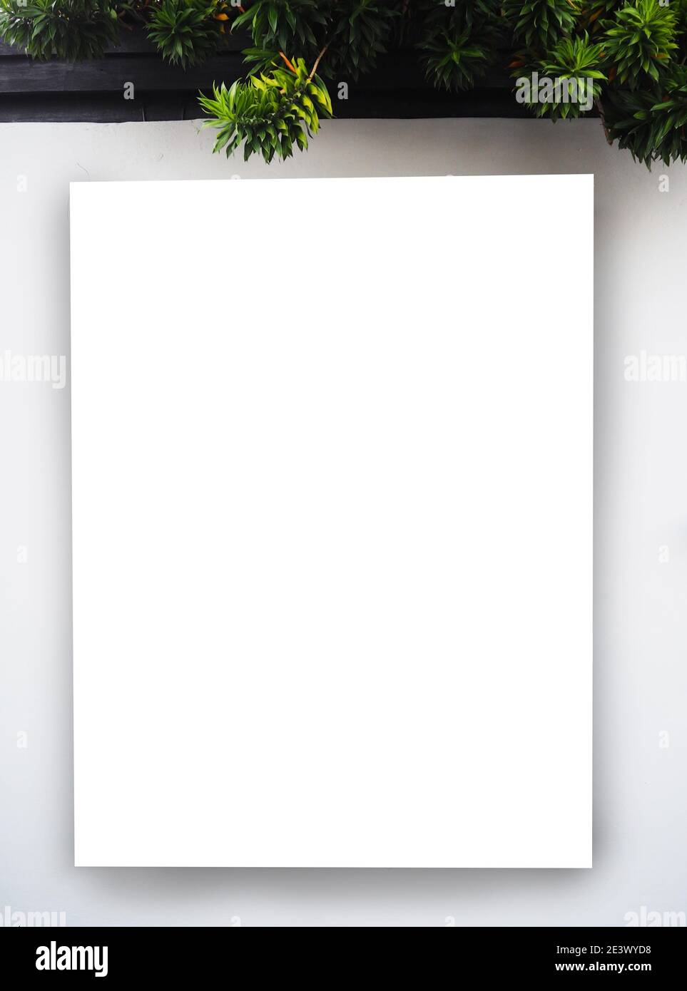 Blank frame billboard mockup on grey concrete wall background. space for text or design Stock Photo