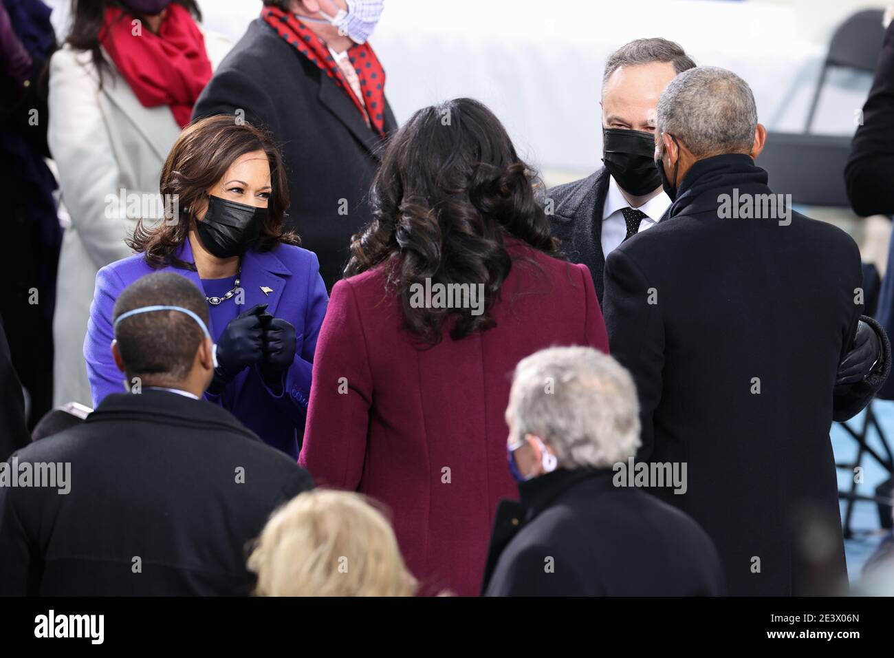 Washington, USA. 20th Jan, 2021.Doug Emhoff and Vice President-elect Kamala Harris speak with First Lady Michelle Obama and President Barack Obama during the Inauguration Day ceremony of President-Elect Joe Biden and Vice President-Elect Kamala Harris held at the U.S. Capitol Building in Washington, D.C. on Jan. 20, 2021. President-elect Joe Biden becomes the 46th President of the United States at noon on Inauguration Day. (Photo by Oliver Contreras/Sipa USA) Stock Photo
