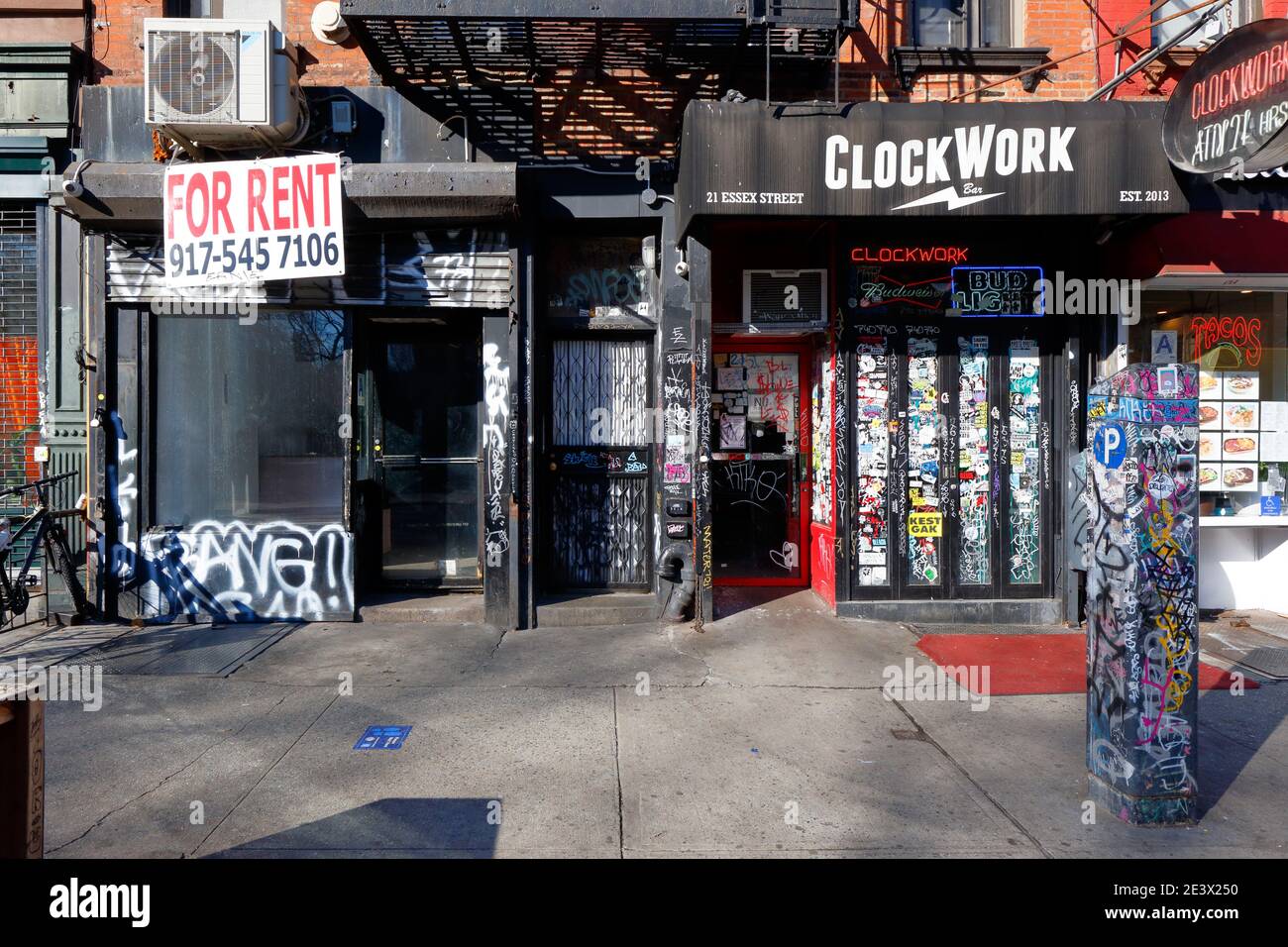 Clockwork Bar, 21 Essex St, New York, NYC storefront photo of a punk rock bar in Manhattan's Lower East Side neighborhood. Stock Photo