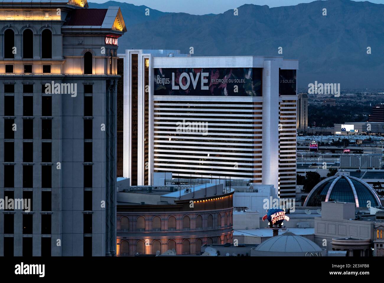 The Mirage sits behind Caesars Palace in Las Vegas at dawn Stock Photo