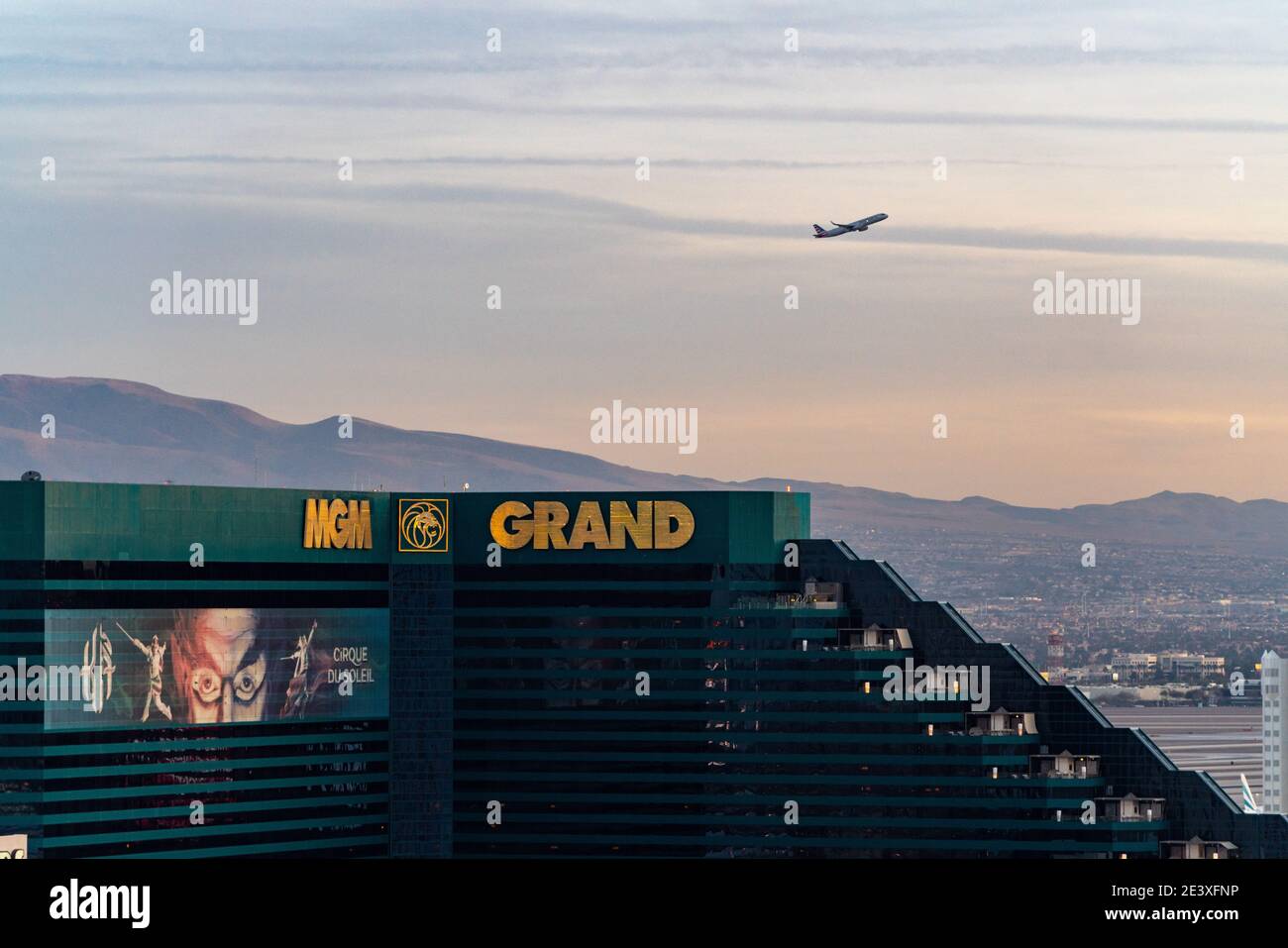 A plane taking off from McCarran International airport flies over the MGM Grand in Las Vegas Stock Photo