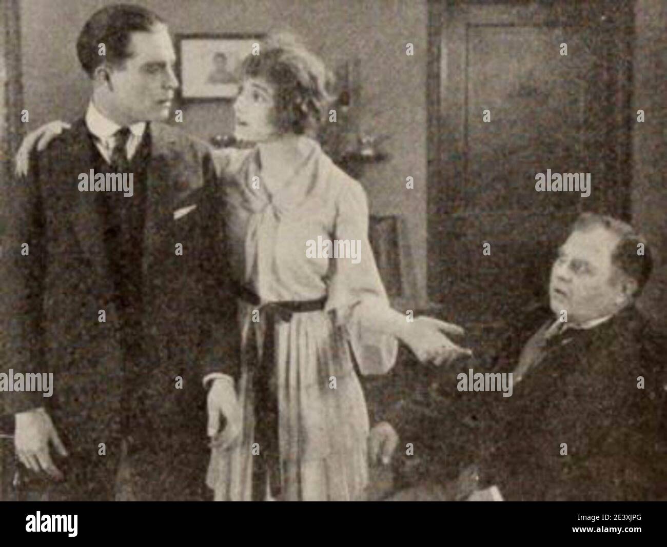 Still from the American comedy romance film Good Night, Paul (1918) with Harrison Ford, Constance Talmadge, and John Steppling, on page 25 of the July 6, 1918 Exhibitors Herald. Stock Photo