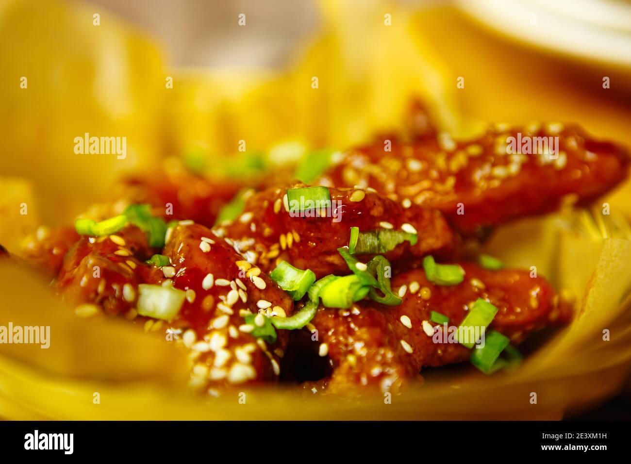 Deep fried chicken strips prepared in deep fryer oven in fast food