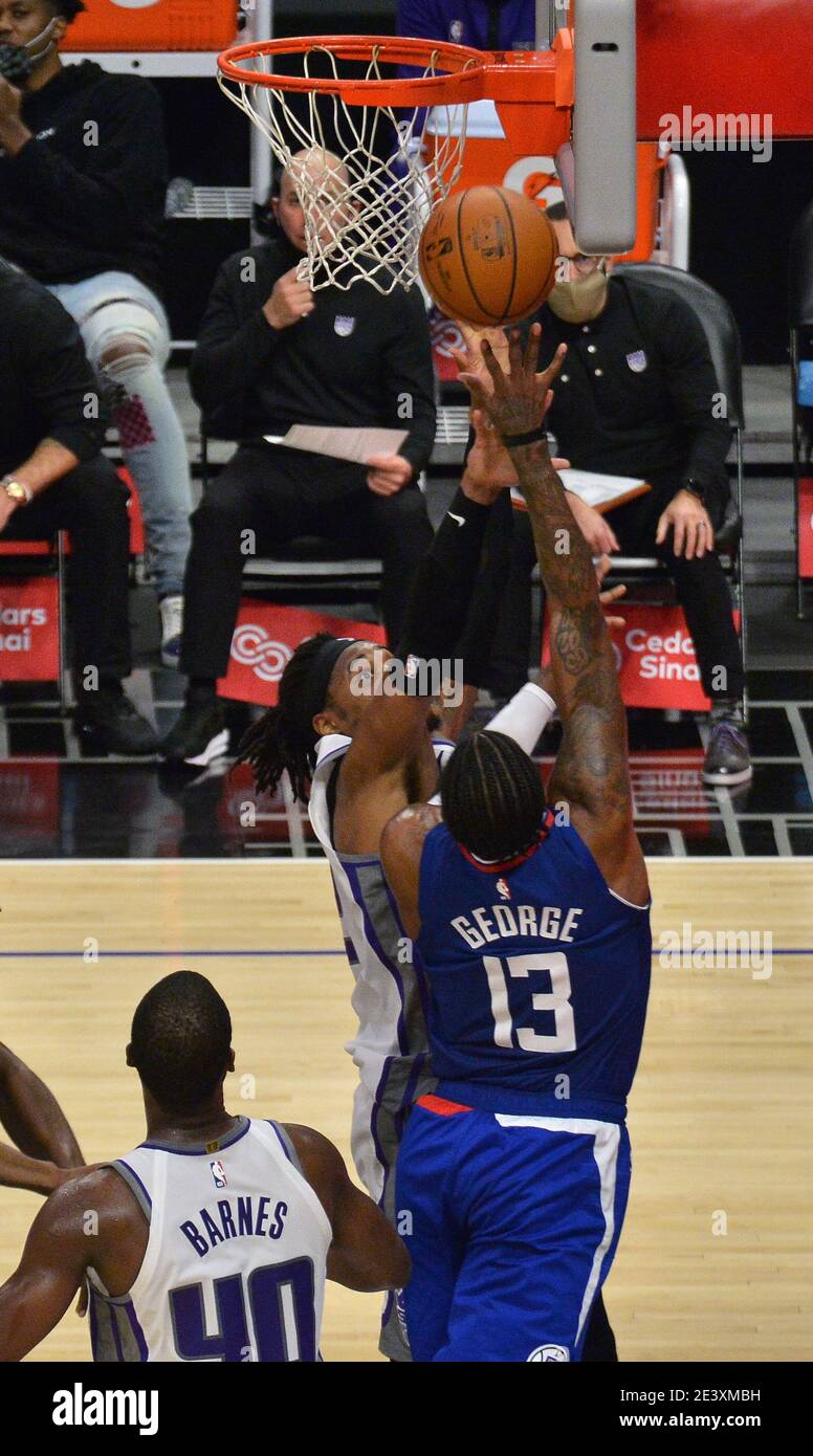 Los Angeles, United States. 20th Jan, 2021. Los Angeles Clippers' forward Paul George scores over Sacramento Kings' center Richaun Holmes during the third quarter at Staples Center in Los Angeles on Wednesday, January 20, 2021. The Clippers defeated the Kings 115-96. Photo by Jim Ruymen/UPI Credit: UPI/Alamy Live News Stock Photo