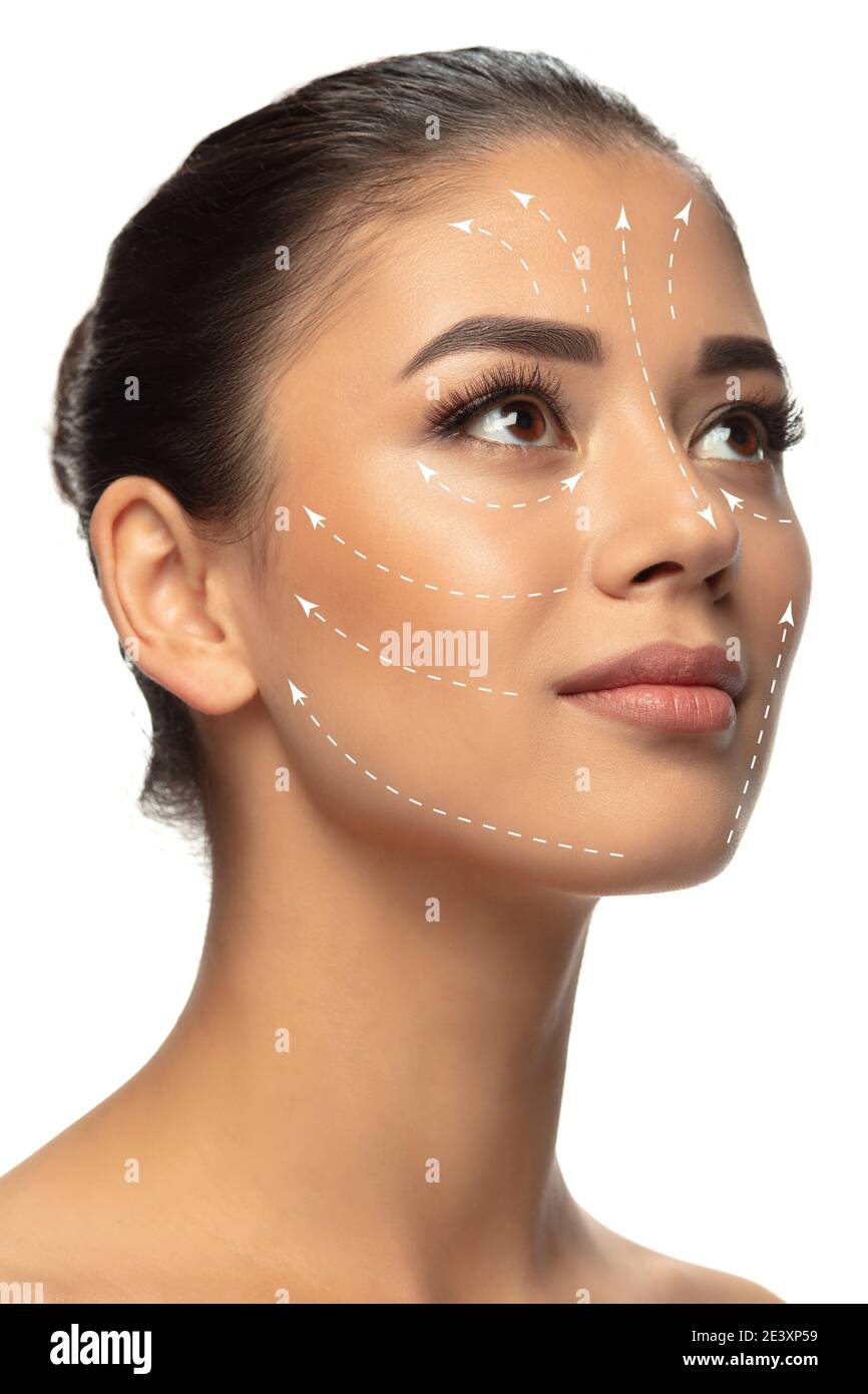 Beautiful female face with lifting up arrows isolated on white background.  Concept of bodycare, cosmetics, skincare, correction surgery, beauty and  perfect skin. Flyer for your ad. Antiaging Stock Photo - Alamy, image size:866x1390