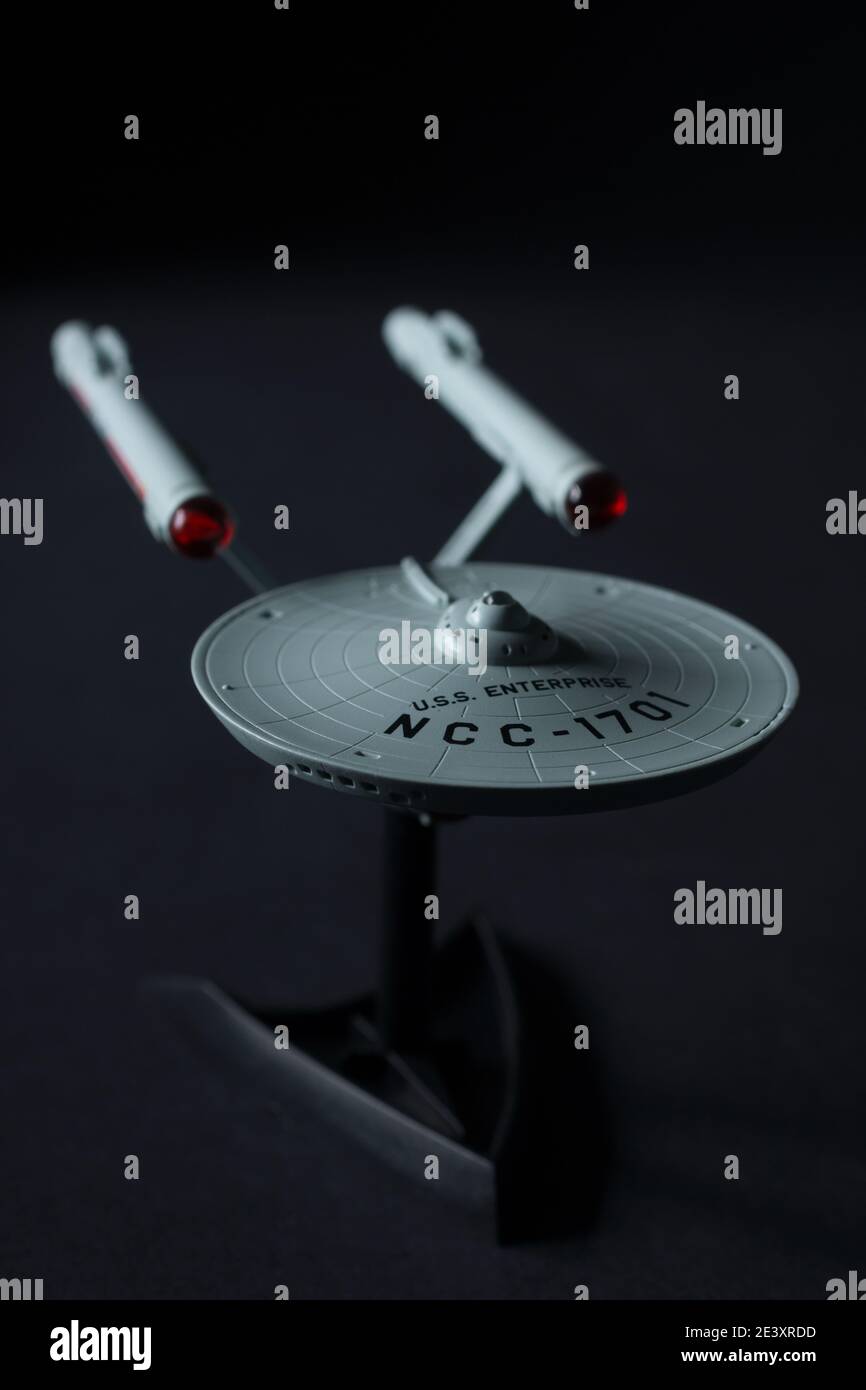 USS Enterprise model based on the space ship from the TV series Star Trek created by Gene Roddenberry on a black background Stock Photo