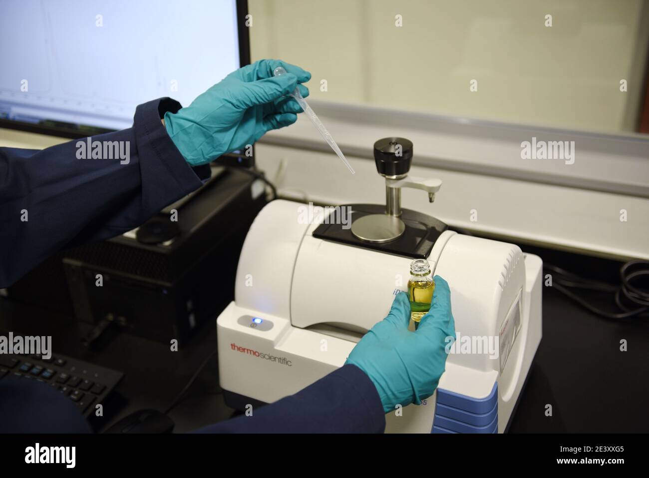 Nicolet iS5 FTIR Spectrometer provides information and for product assurance testing and material. It is designed for scientists, production managers Stock Photo