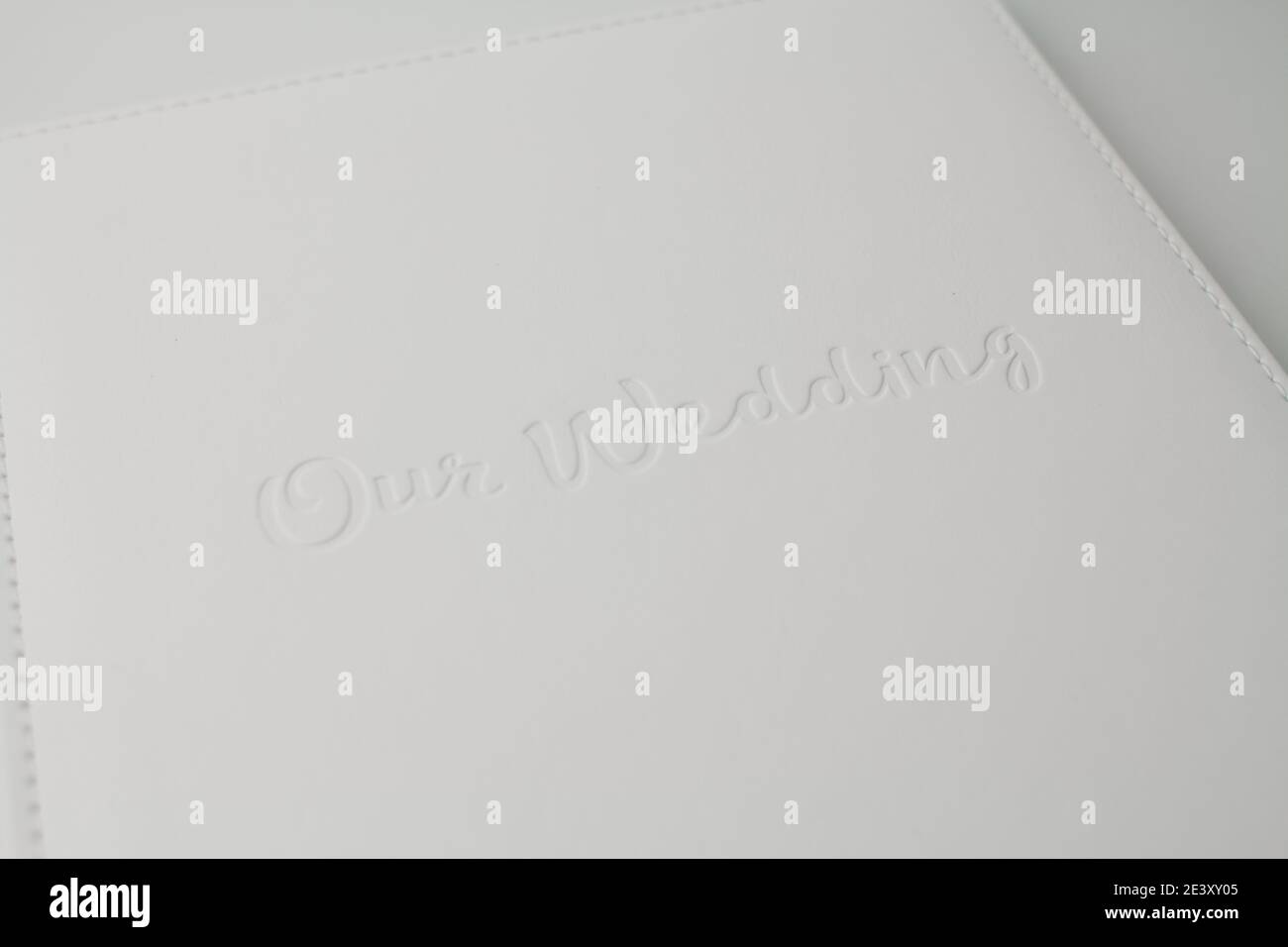 a white wedding photo book from white leather on white background Stock Photo