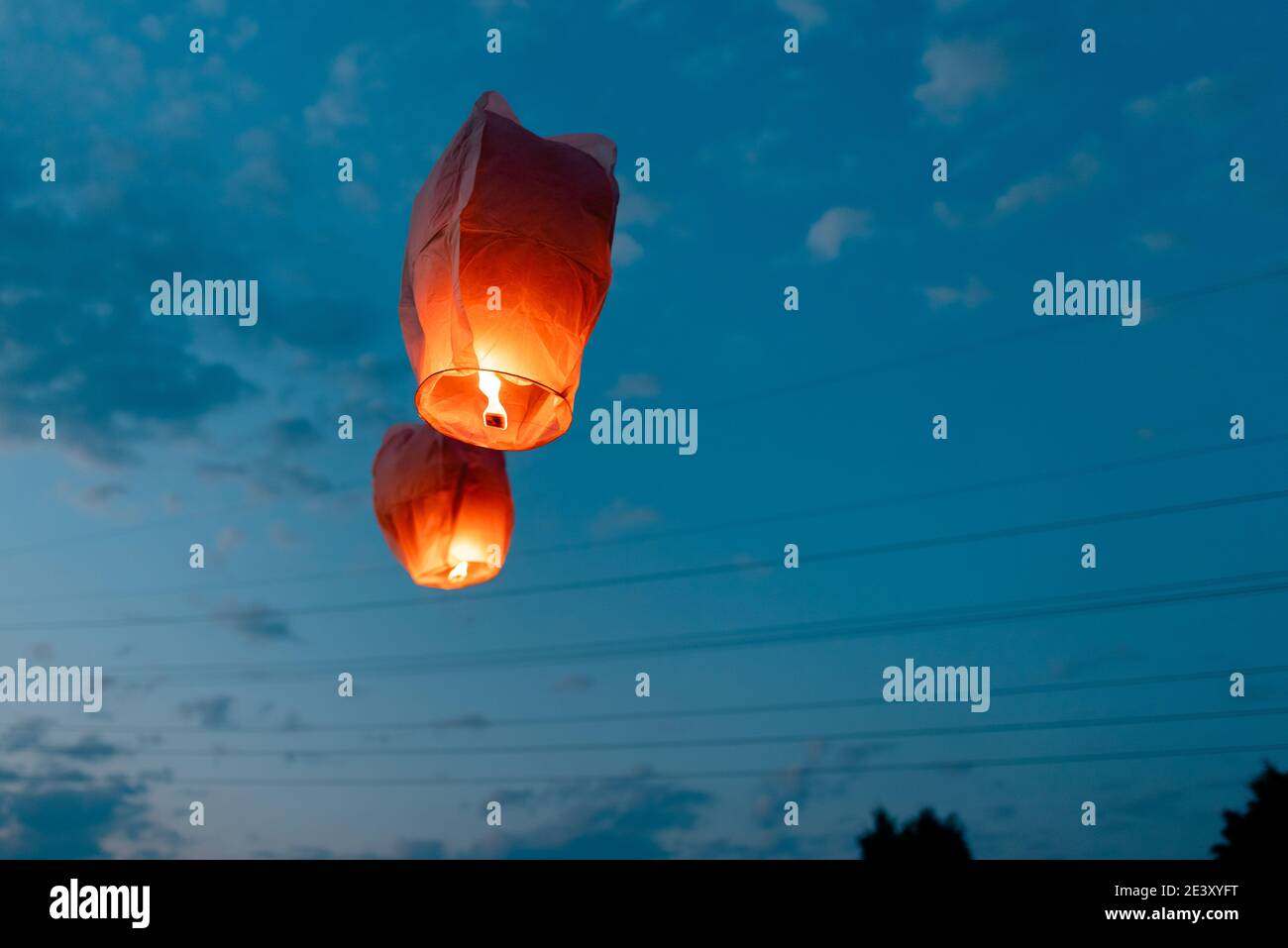 chinese lanterns launched into the air Stock Photo
