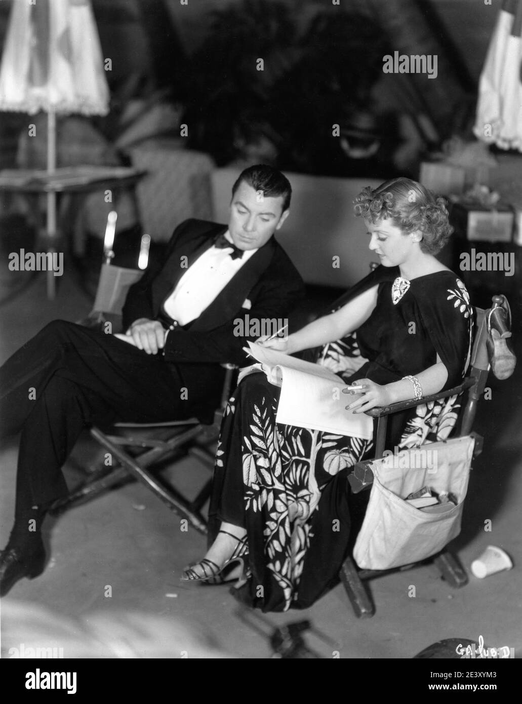 BRENT and BETTE DAVIS going over their lines together on set