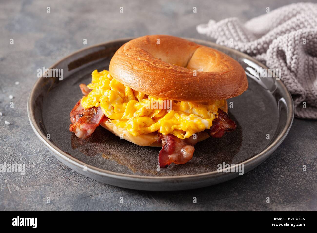 breakfast egg and bacon sandwich on bagel with cheese Stock Photo - Alamy