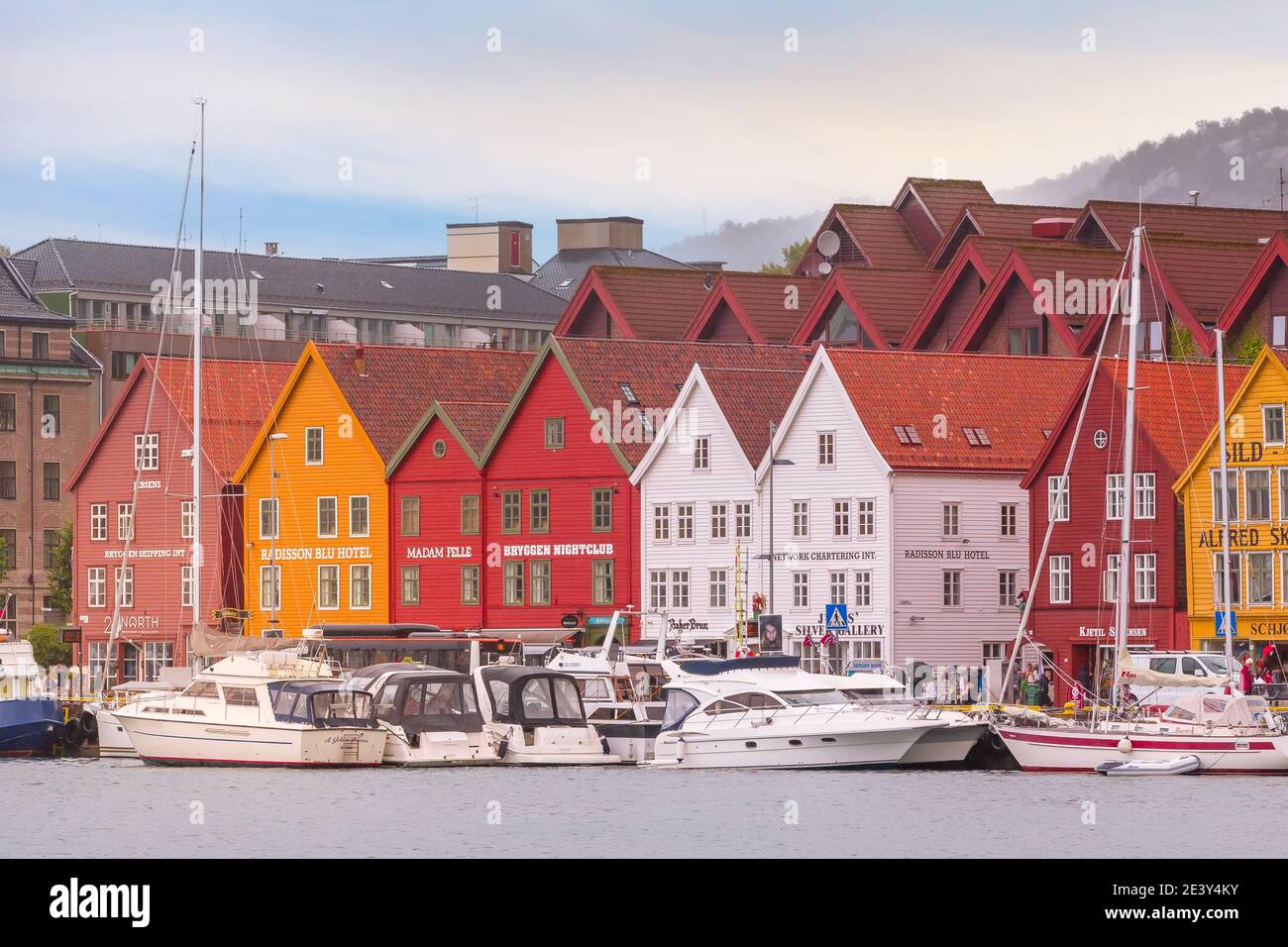 Bergen, Norway - July 30, 2018: City street Bryggen panoramic banner, boats and colorful traditional nordic houses Stock Photo