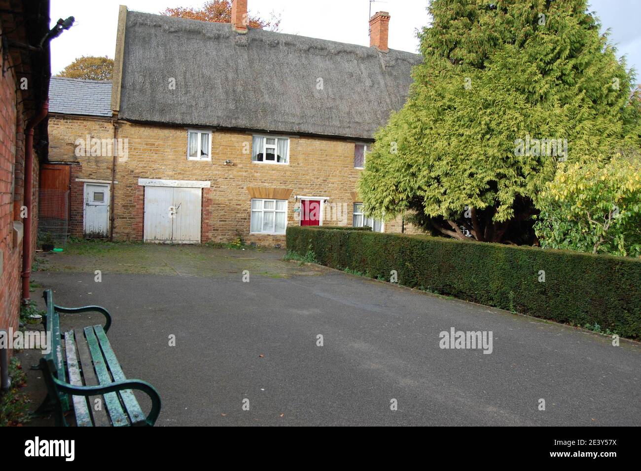 Stone Cottage in Abington Park Northampton UK old style Victorian hedge