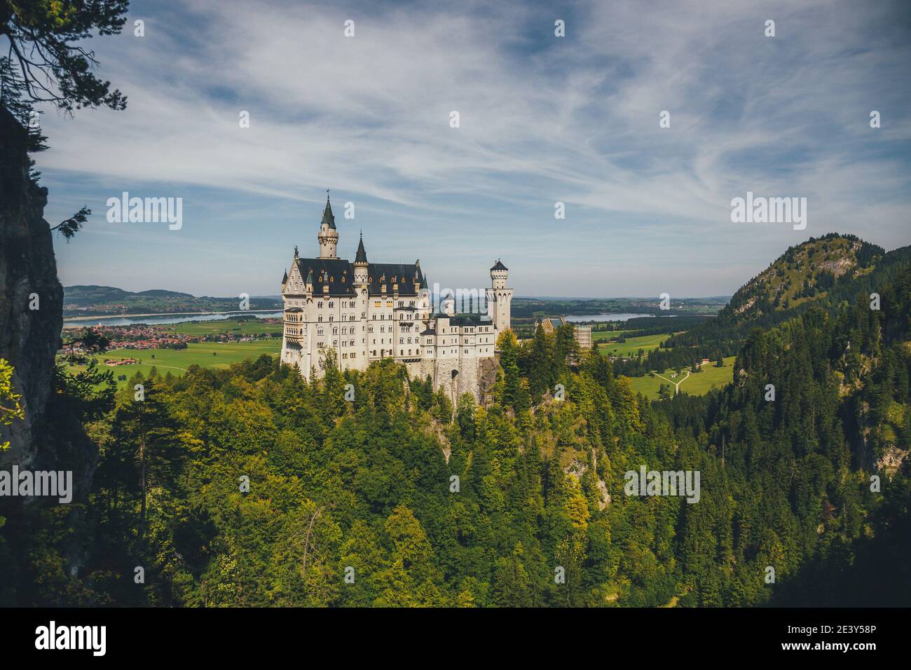 Beautiful view of world-famous Neuschwanstein Castle, the 19th century Romanesque Revival palace built for King Ludwig II, with scenic mountain landsc Stock Photo