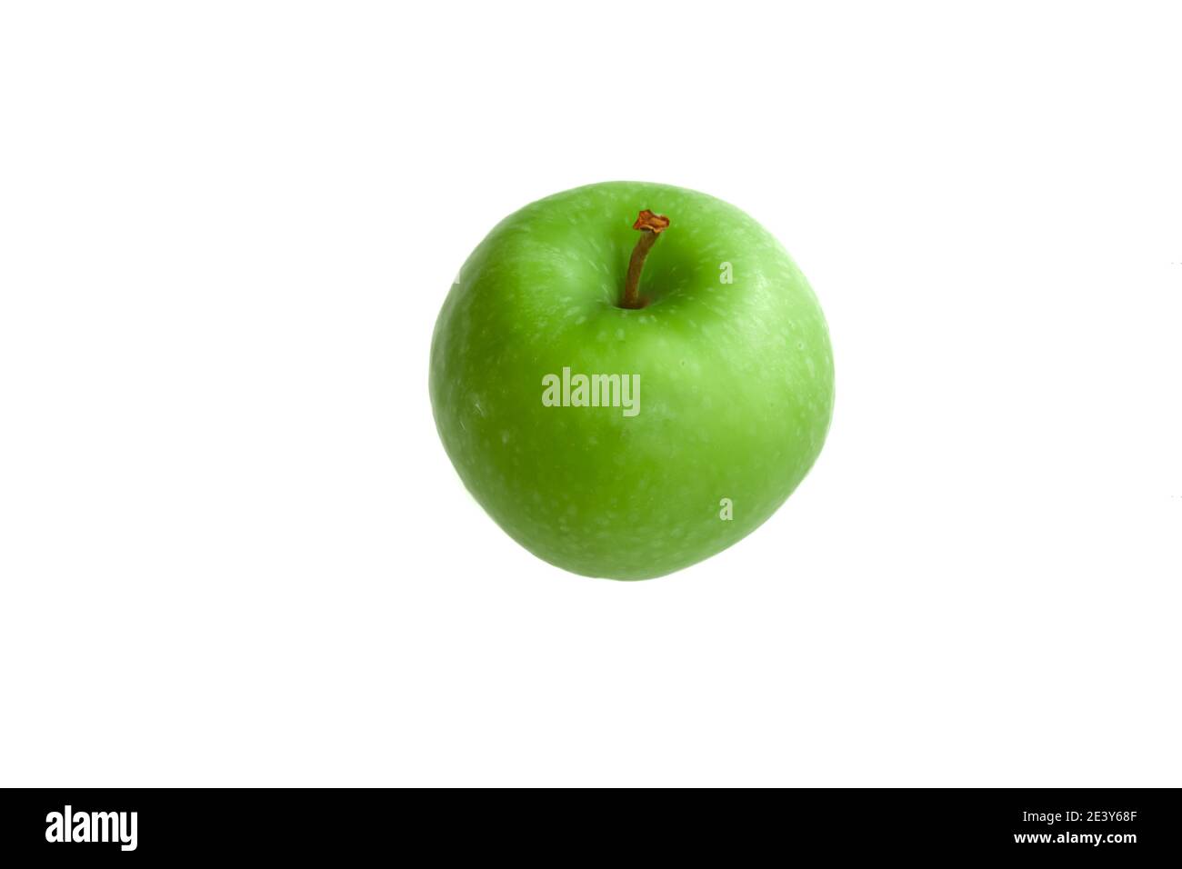 Fresh green apple isolated on white background with space for text. Healthy foods or snack. Stock Photo