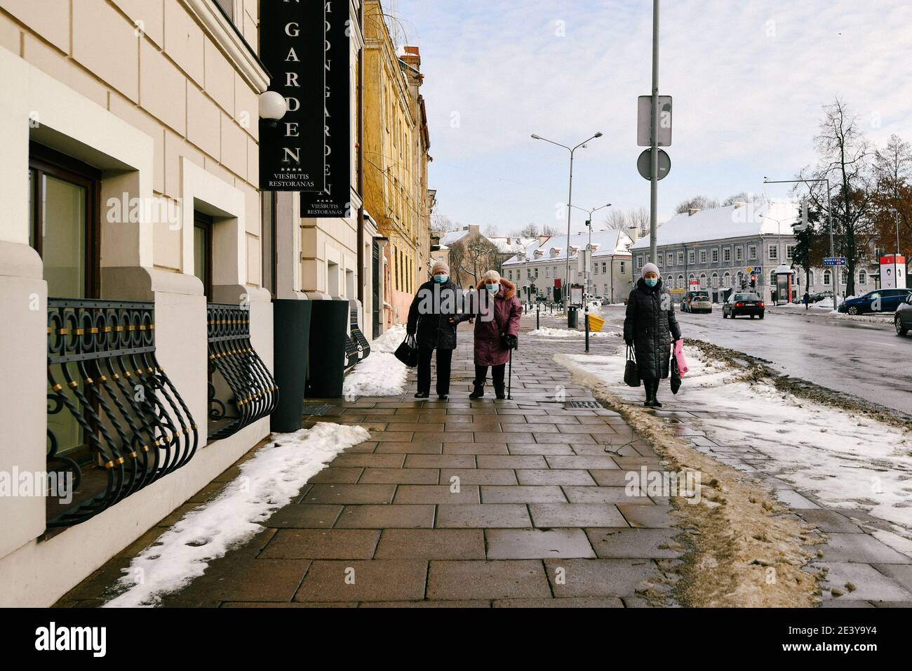 Three old women walking in Vilnius Stock Photo